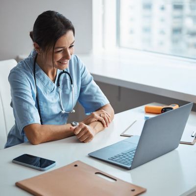 Healthcare professional reviewing practice finances and accounting records