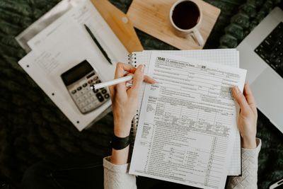 Accountant reviewing tax forms and medical practice deductions