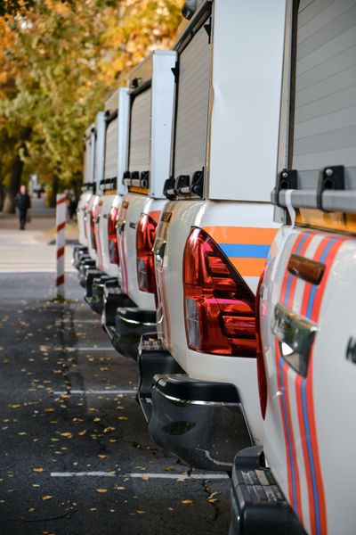 Fleet of contractor work trucks and heavy equipment ready for Section 179 depreciation