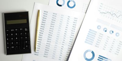 Property depreciation schedules and calculations on paper
