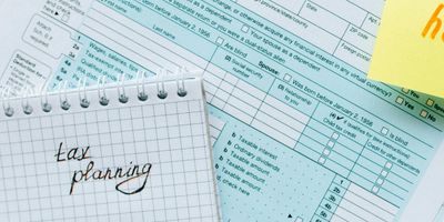 Tax document and notepad for tax planning